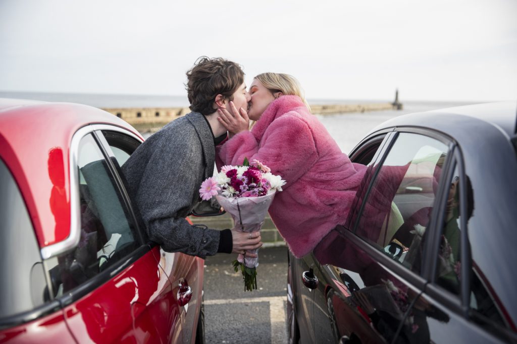 two people kissing